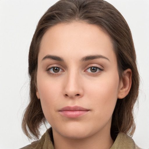 Neutral white young-adult female with medium  brown hair and brown eyes