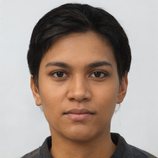 Neutral latino young-adult female with short  black hair and brown eyes