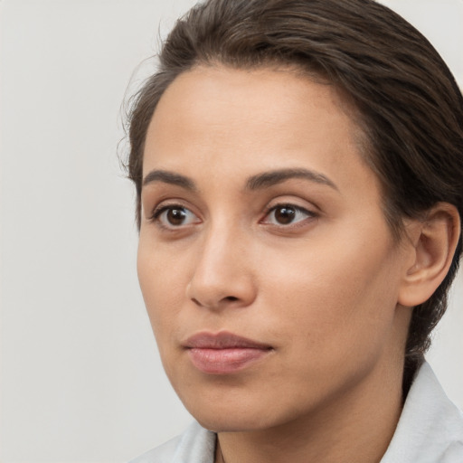 Neutral white young-adult female with medium  brown hair and brown eyes