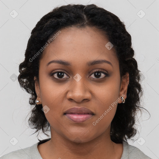 Joyful black young-adult female with medium  black hair and brown eyes