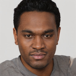 Neutral black young-adult male with short  black hair and brown eyes