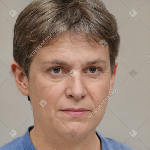 Joyful white adult male with short  brown hair and grey eyes