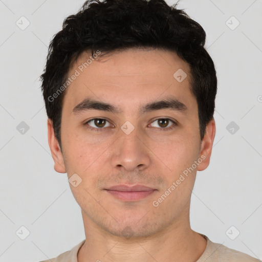 Joyful white young-adult male with short  black hair and brown eyes