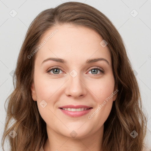 Joyful white young-adult female with long  brown hair and grey eyes