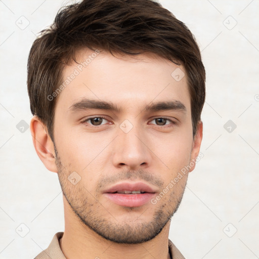 Neutral white young-adult male with short  brown hair and brown eyes