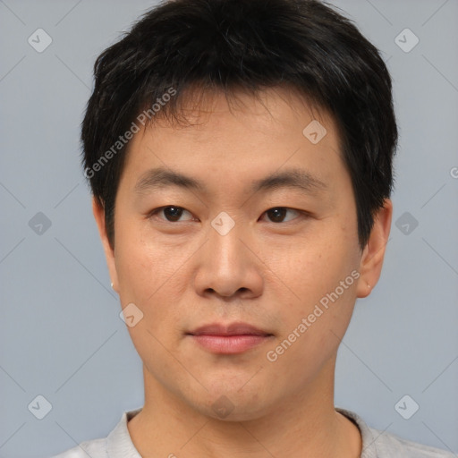 Neutral asian young-adult male with short  black hair and brown eyes