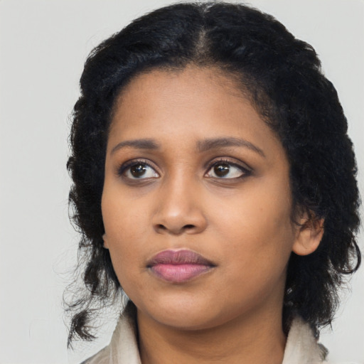 Neutral black young-adult female with long  black hair and brown eyes