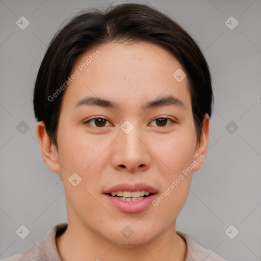 Joyful asian young-adult female with short  brown hair and brown eyes