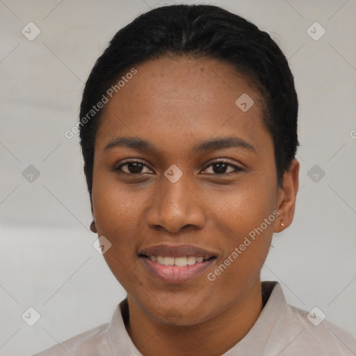 Joyful latino young-adult female with short  black hair and brown eyes