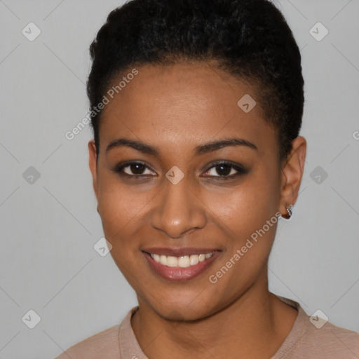 Joyful black young-adult female with short  black hair and brown eyes