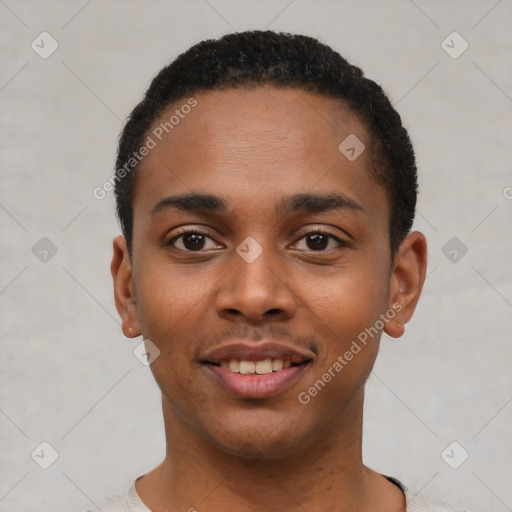 Joyful black young-adult male with short  black hair and brown eyes