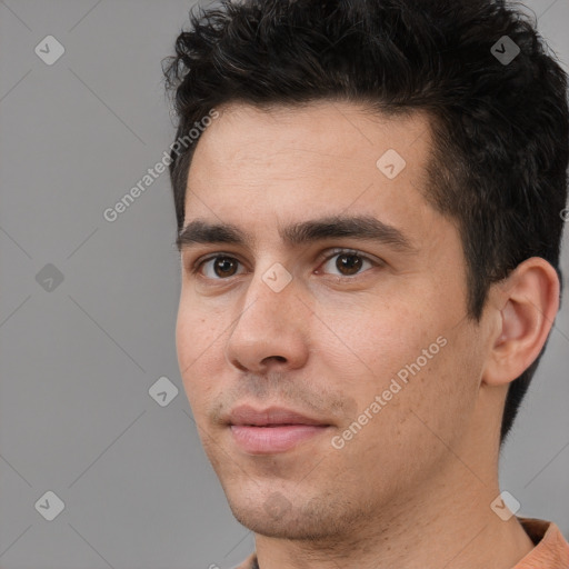 Neutral white young-adult male with short  black hair and brown eyes