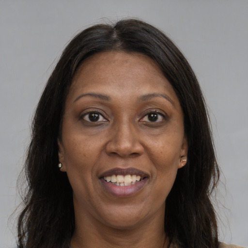 Joyful asian adult female with long  brown hair and brown eyes