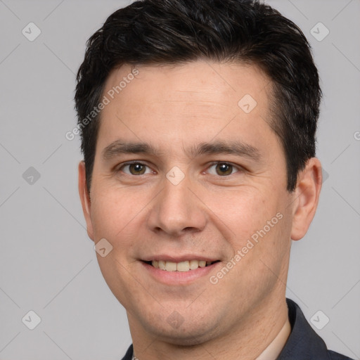 Joyful white young-adult male with short  brown hair and brown eyes