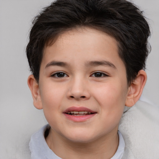 Joyful white child female with short  brown hair and brown eyes