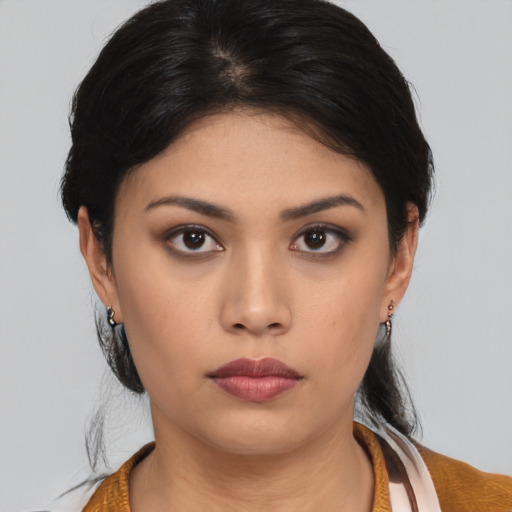 Neutral asian young-adult female with medium  black hair and brown eyes