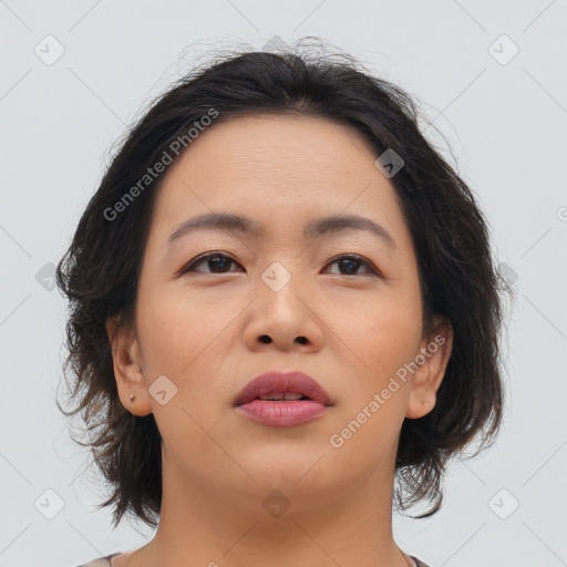 Neutral asian young-adult female with medium  brown hair and brown eyes