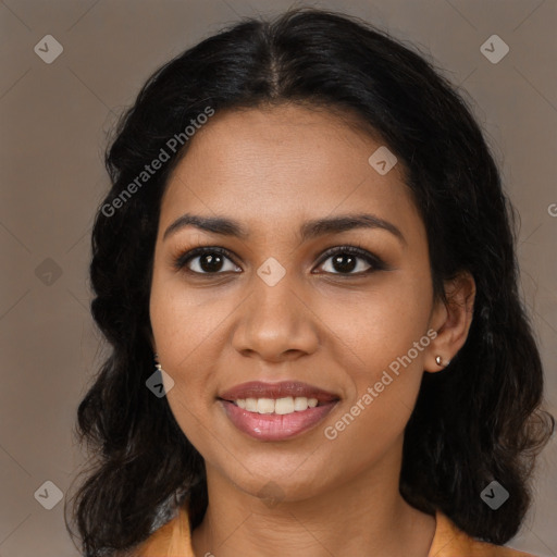 Joyful latino young-adult female with long  brown hair and brown eyes