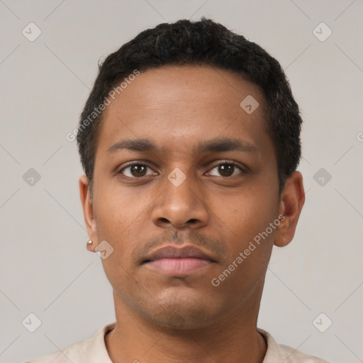Neutral black young-adult male with short  brown hair and brown eyes