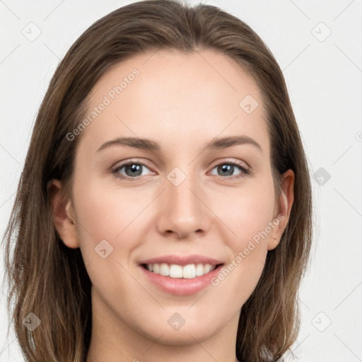 Joyful white young-adult female with long  brown hair and grey eyes