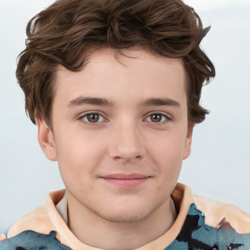 Joyful white child male with short  brown hair and brown eyes