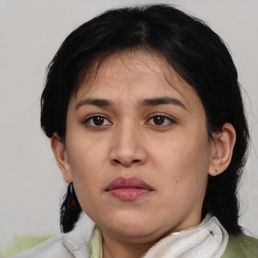 Neutral asian adult female with medium  black hair and brown eyes