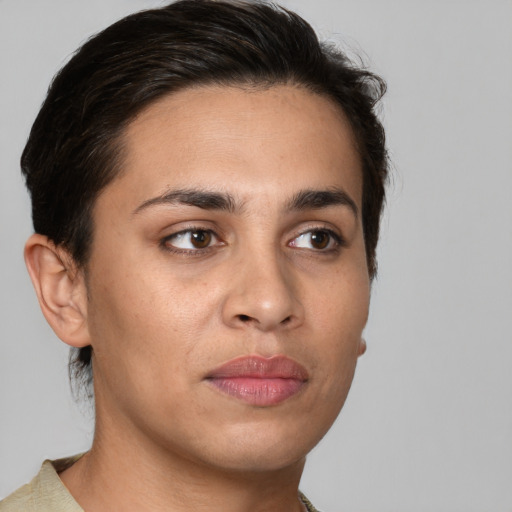 Joyful white young-adult female with short  brown hair and brown eyes