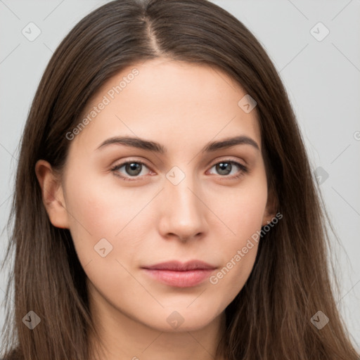 Neutral white young-adult female with long  brown hair and brown eyes