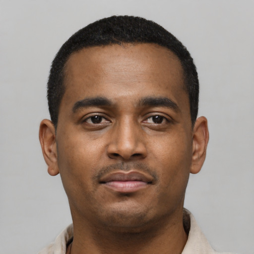 Neutral black young-adult male with short  black hair and brown eyes