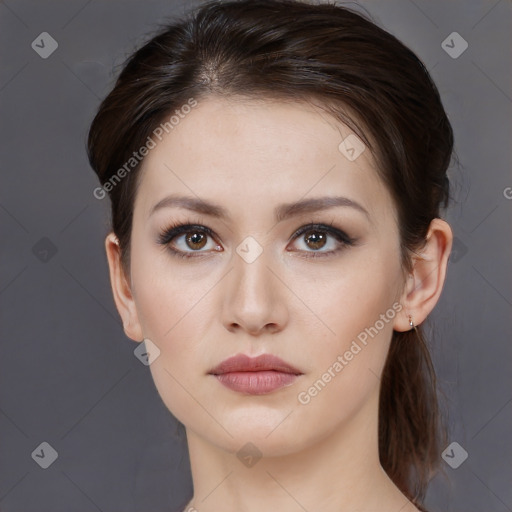 Neutral white young-adult female with medium  brown hair and brown eyes