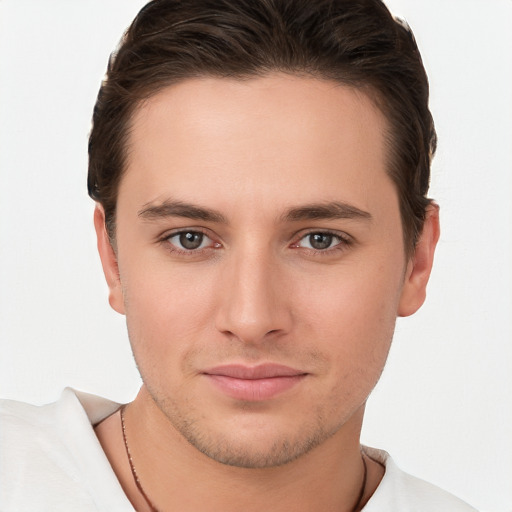 Joyful white young-adult male with short  brown hair and brown eyes