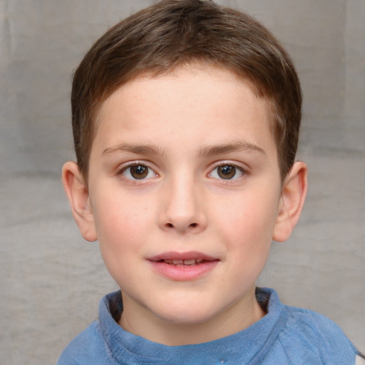 Joyful white child male with short  brown hair and brown eyes