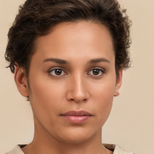 Neutral white young-adult female with short  brown hair and brown eyes