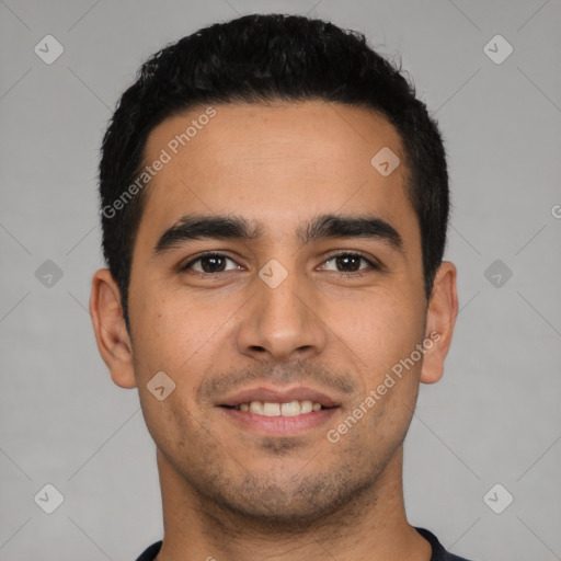 Joyful latino young-adult male with short  black hair and brown eyes