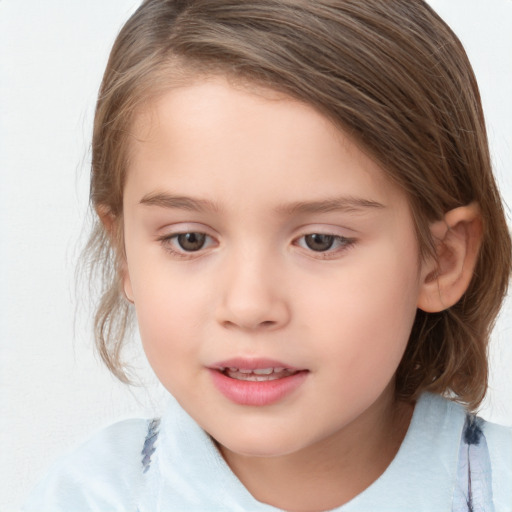 Joyful white child female with medium  brown hair and grey eyes