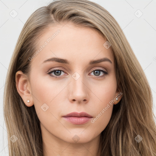 Neutral white young-adult female with long  brown hair and brown eyes