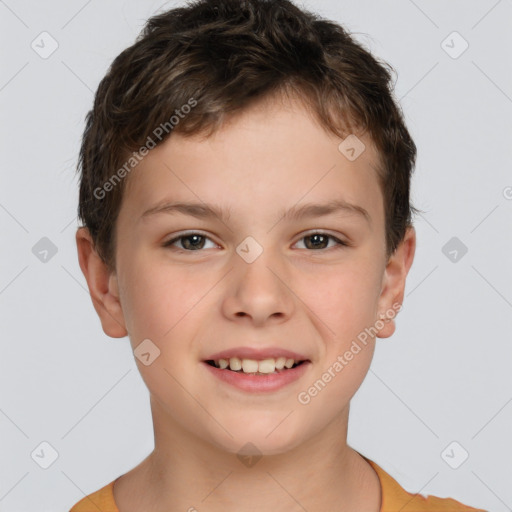 Joyful white child male with short  brown hair and brown eyes