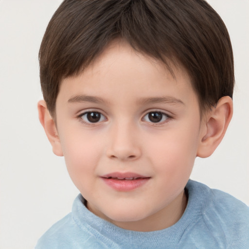 Joyful white child female with short  brown hair and brown eyes