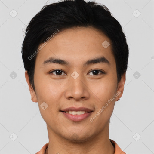 Joyful asian young-adult male with short  black hair and brown eyes