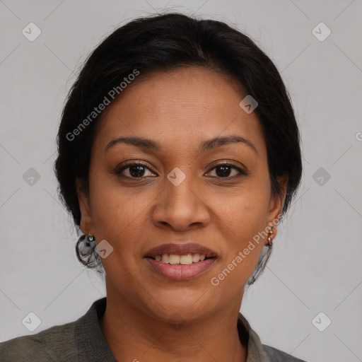 Joyful latino young-adult female with medium  brown hair and brown eyes