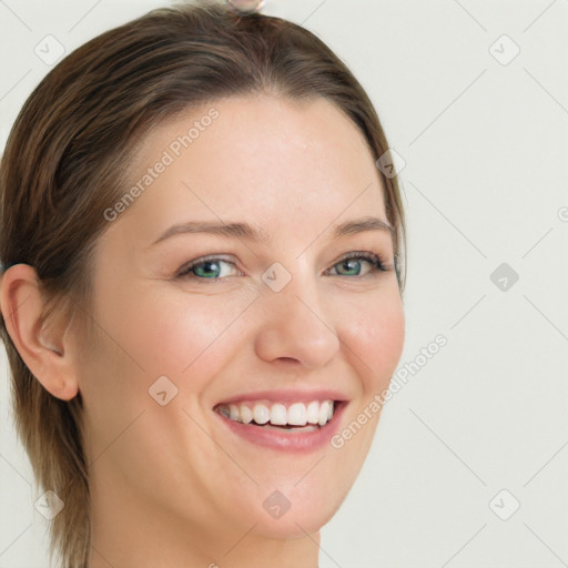 Joyful white young-adult female with medium  brown hair and green eyes