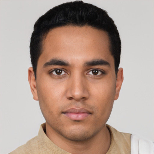 Neutral latino young-adult male with short  black hair and brown eyes
