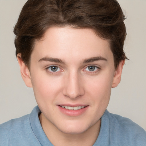 Joyful white young-adult female with short  brown hair and blue eyes