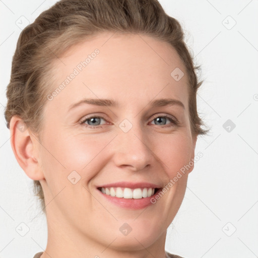 Joyful white young-adult female with short  brown hair and grey eyes