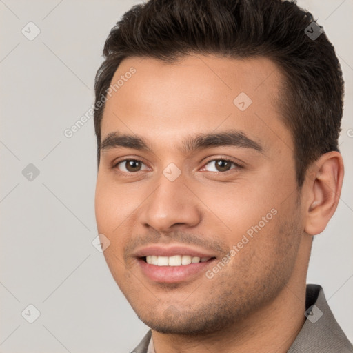 Joyful white young-adult male with short  brown hair and brown eyes