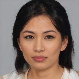 Neutral asian young-adult female with medium  black hair and brown eyes