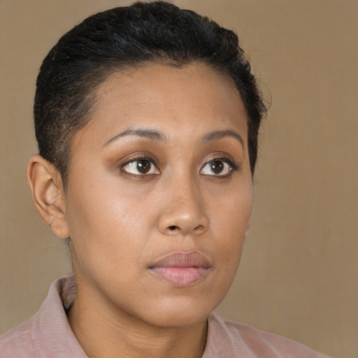Neutral black young-adult female with short  brown hair and brown eyes