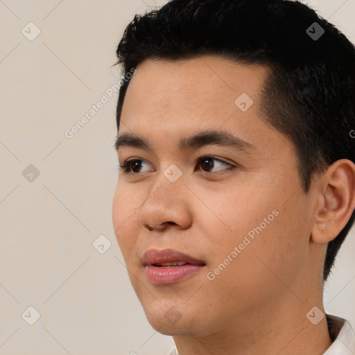 Joyful asian young-adult male with short  black hair and brown eyes