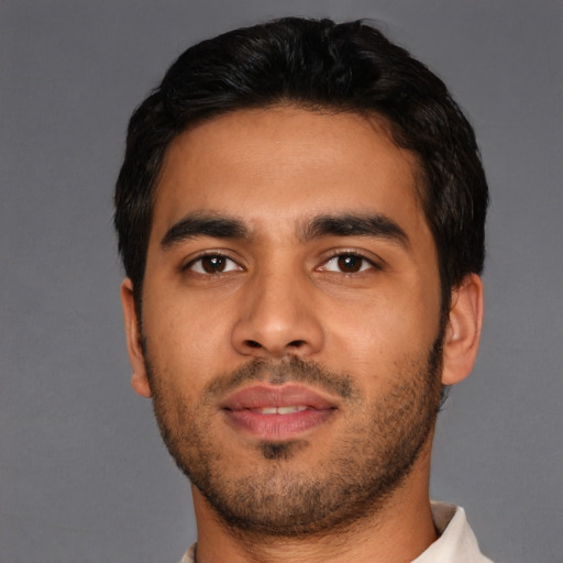 Neutral latino young-adult male with short  black hair and brown eyes