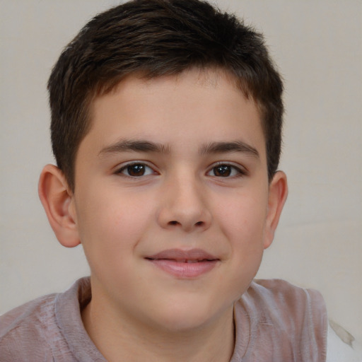 Joyful white child male with short  brown hair and brown eyes